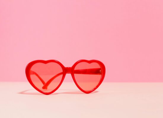 Dark sphere surrounded by swirling white smoke, mysterious atmosphere.